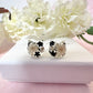 Cat real flower sterling silver stud earrings.