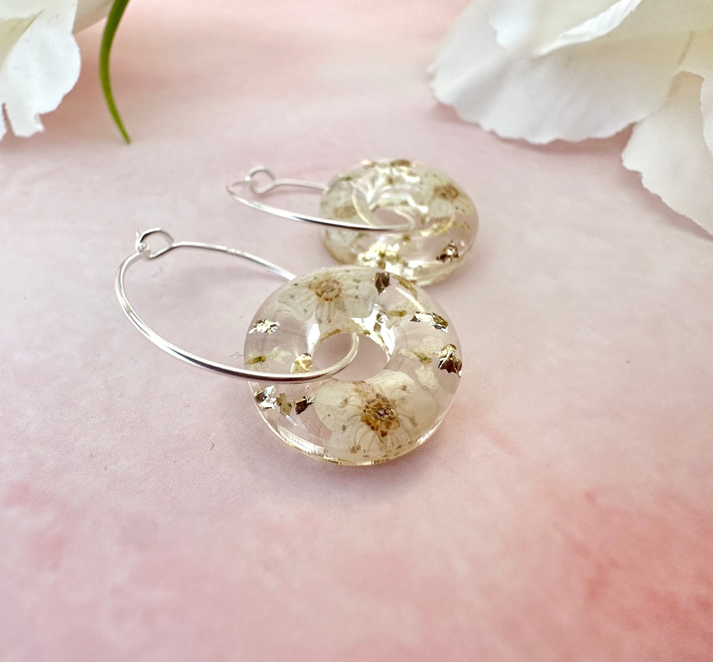 White blossom bloom flower donut earrings.