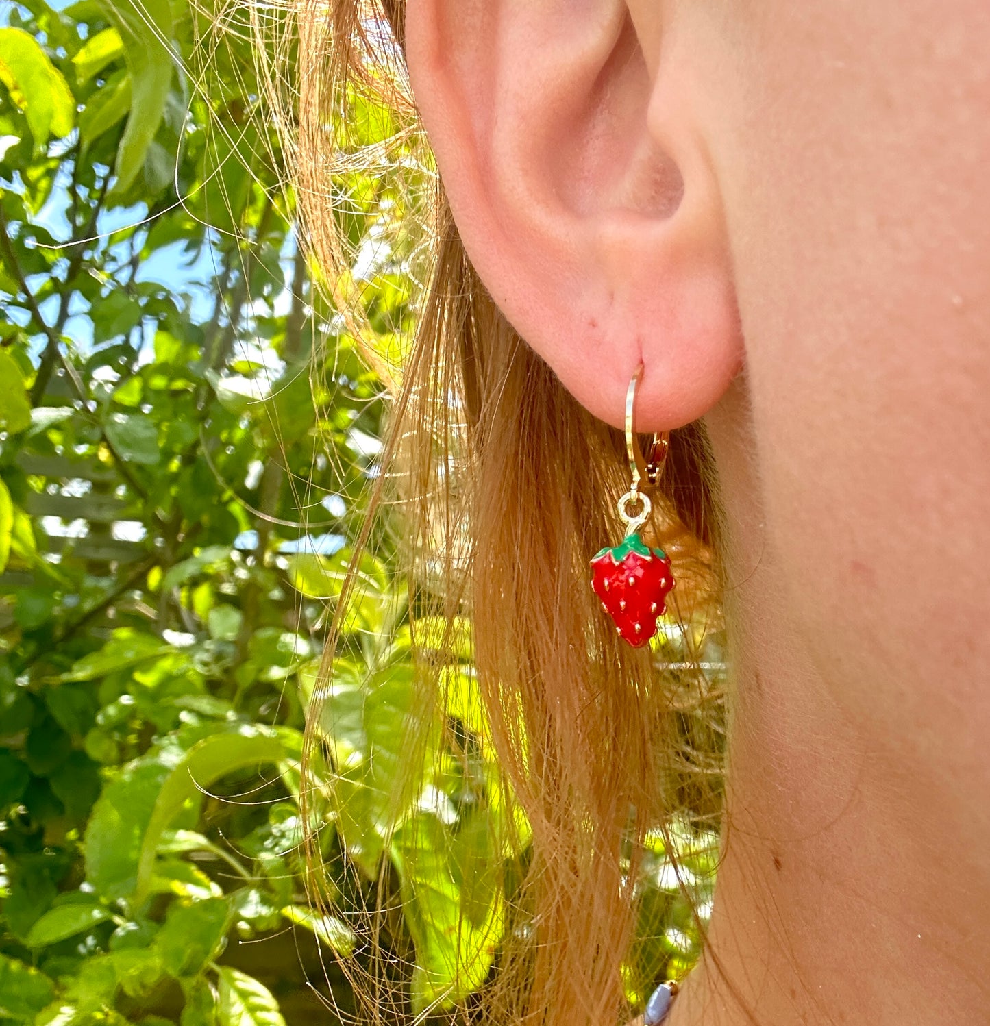 Tiny enamel Strawberry gold huggie earrings.