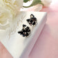 Cat real flower sterling silver stud earrings.