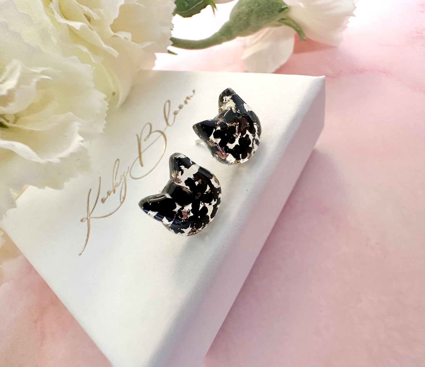 Cat real flower sterling silver stud earrings.