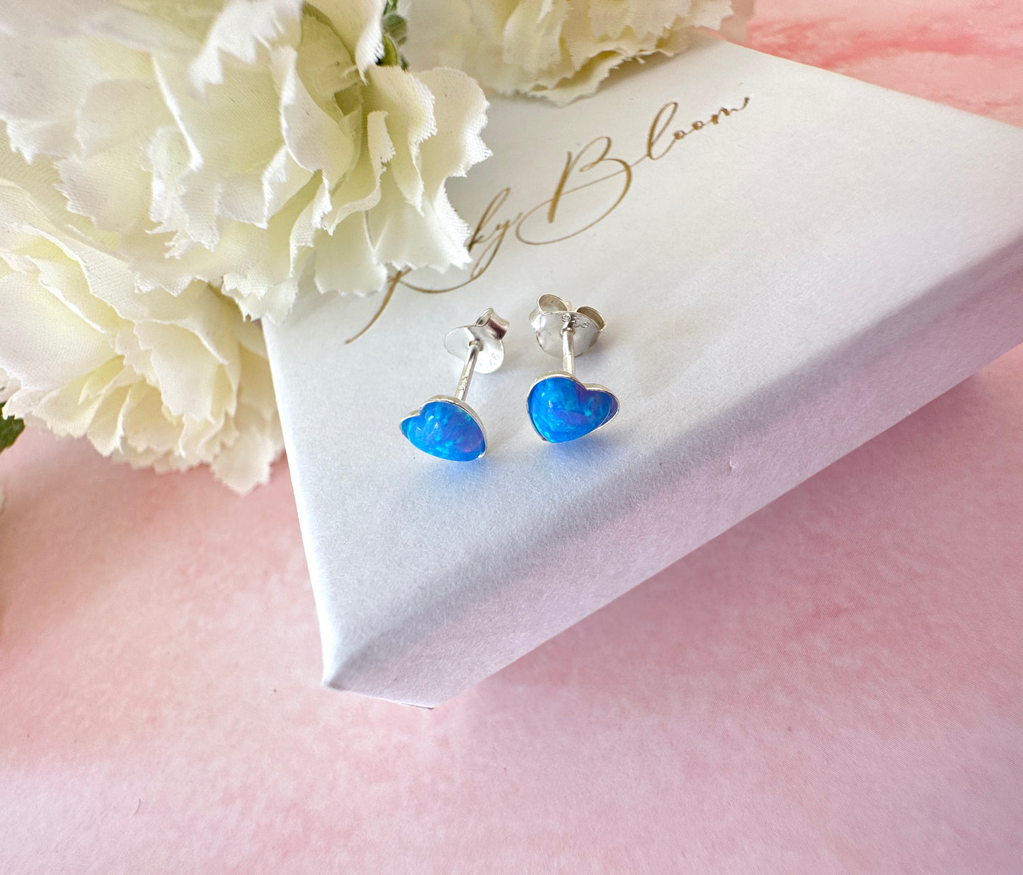 925 Sterling silver Blue Opal heart stud earrings.