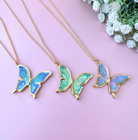 Gold enamel Butterfly necklace.