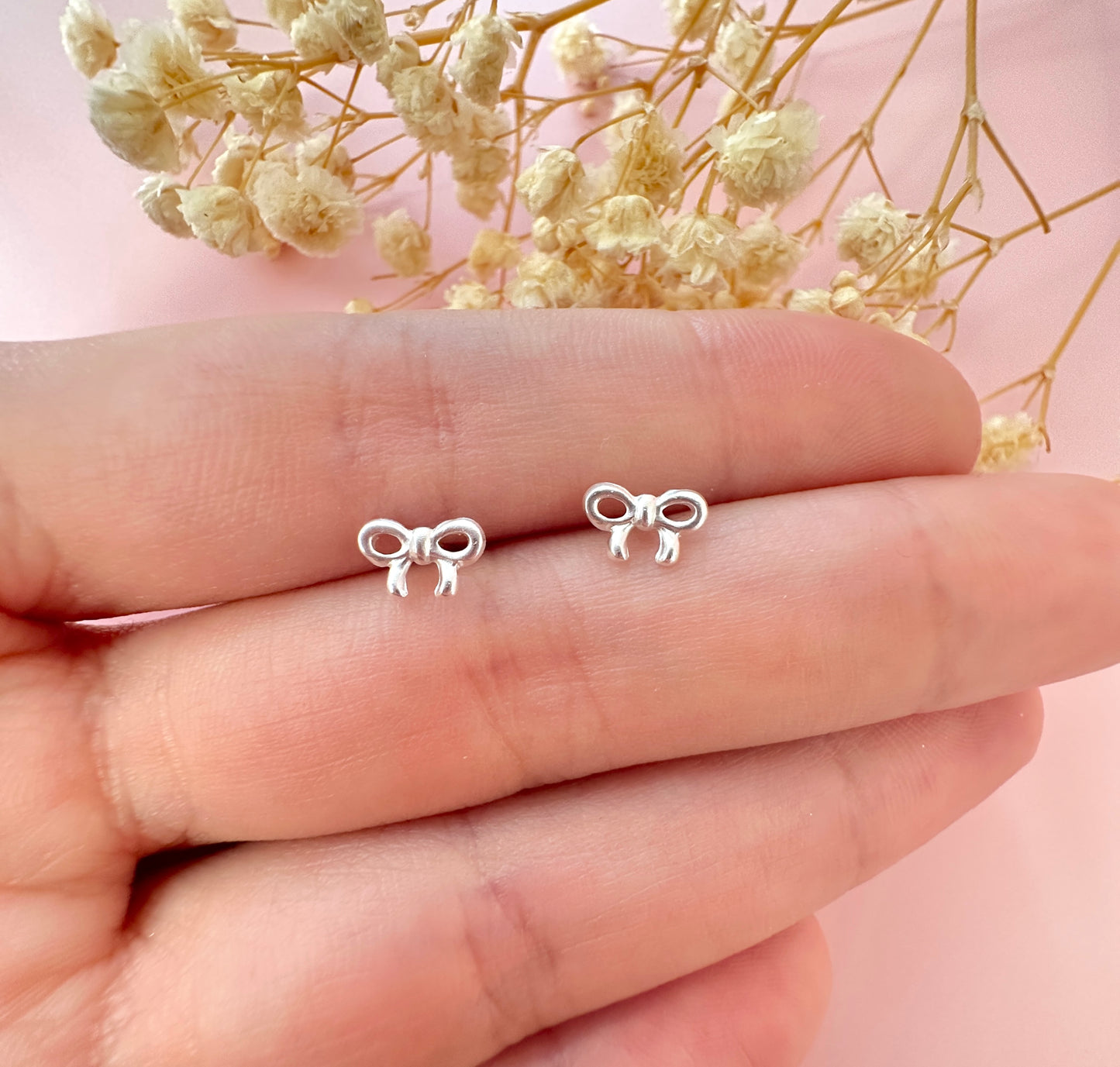 925 Sterling silver Tiny Bow stud earrings.