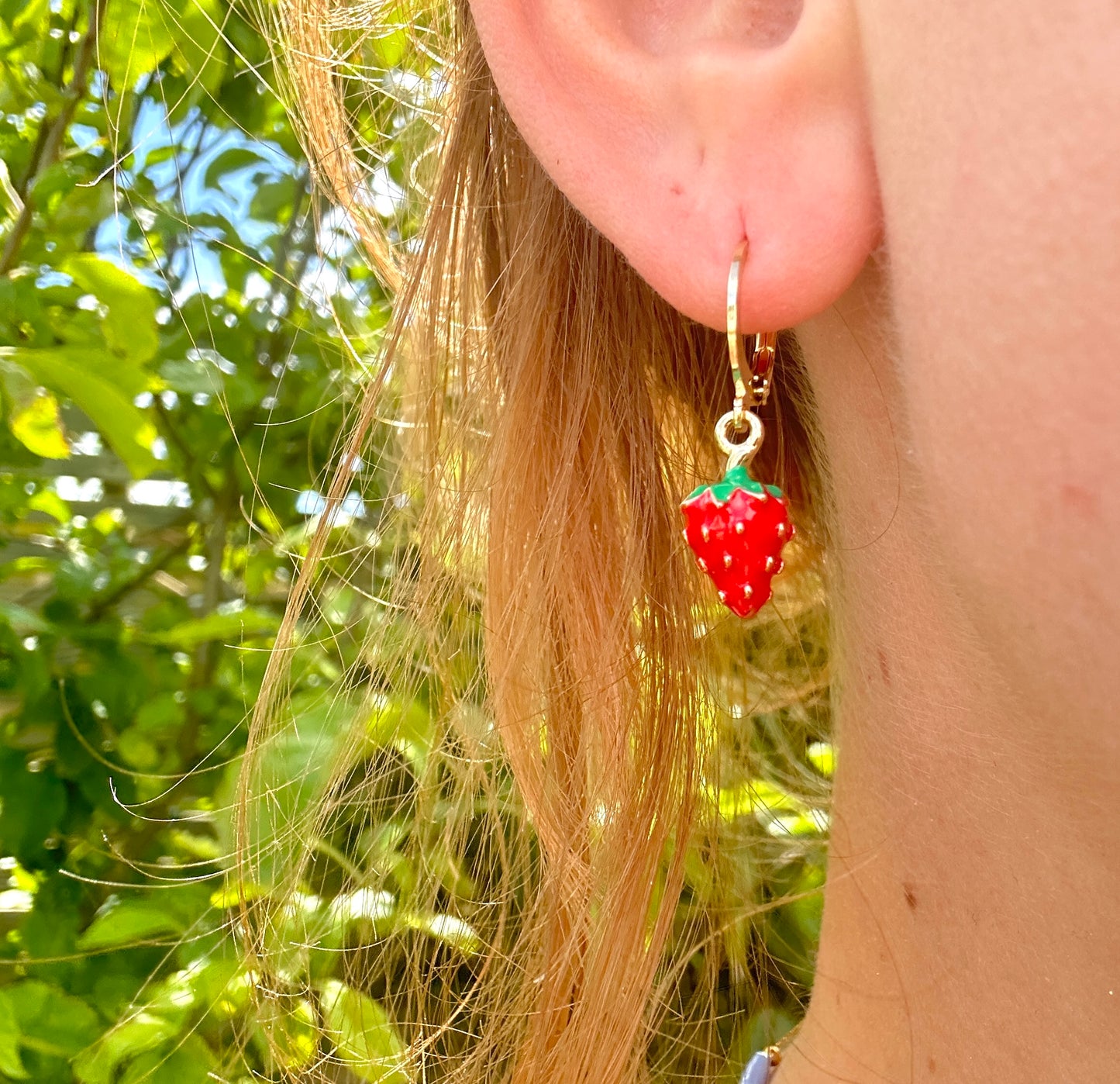 Tiny enamel Strawberry gold huggie earrings.