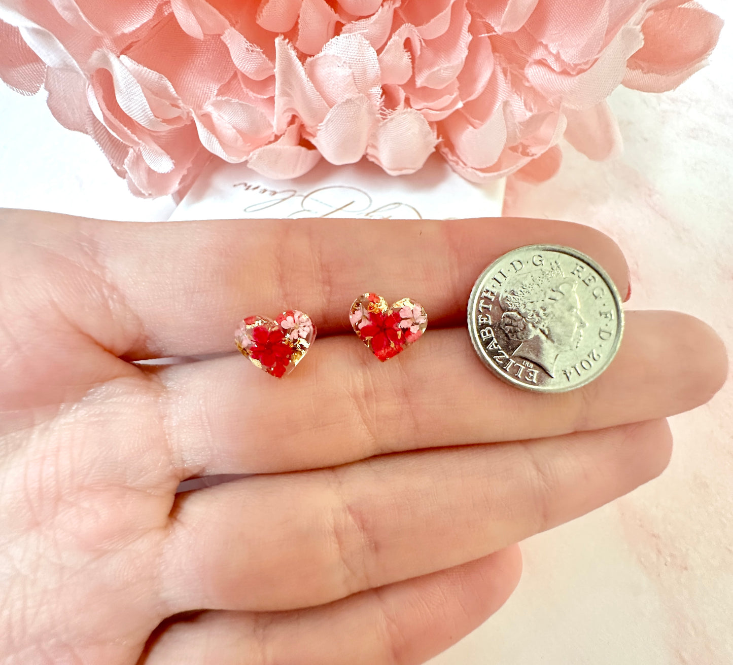 Tiny valentines Bloom Heart Sterling silver stud earrings.