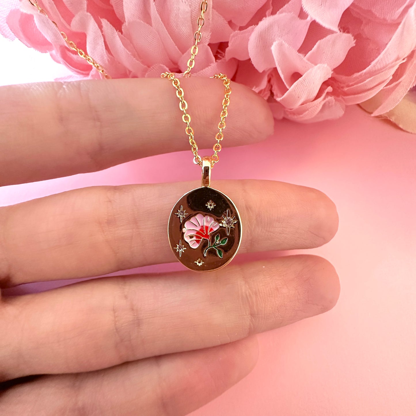 Gold Pink engraved Flower necklace.