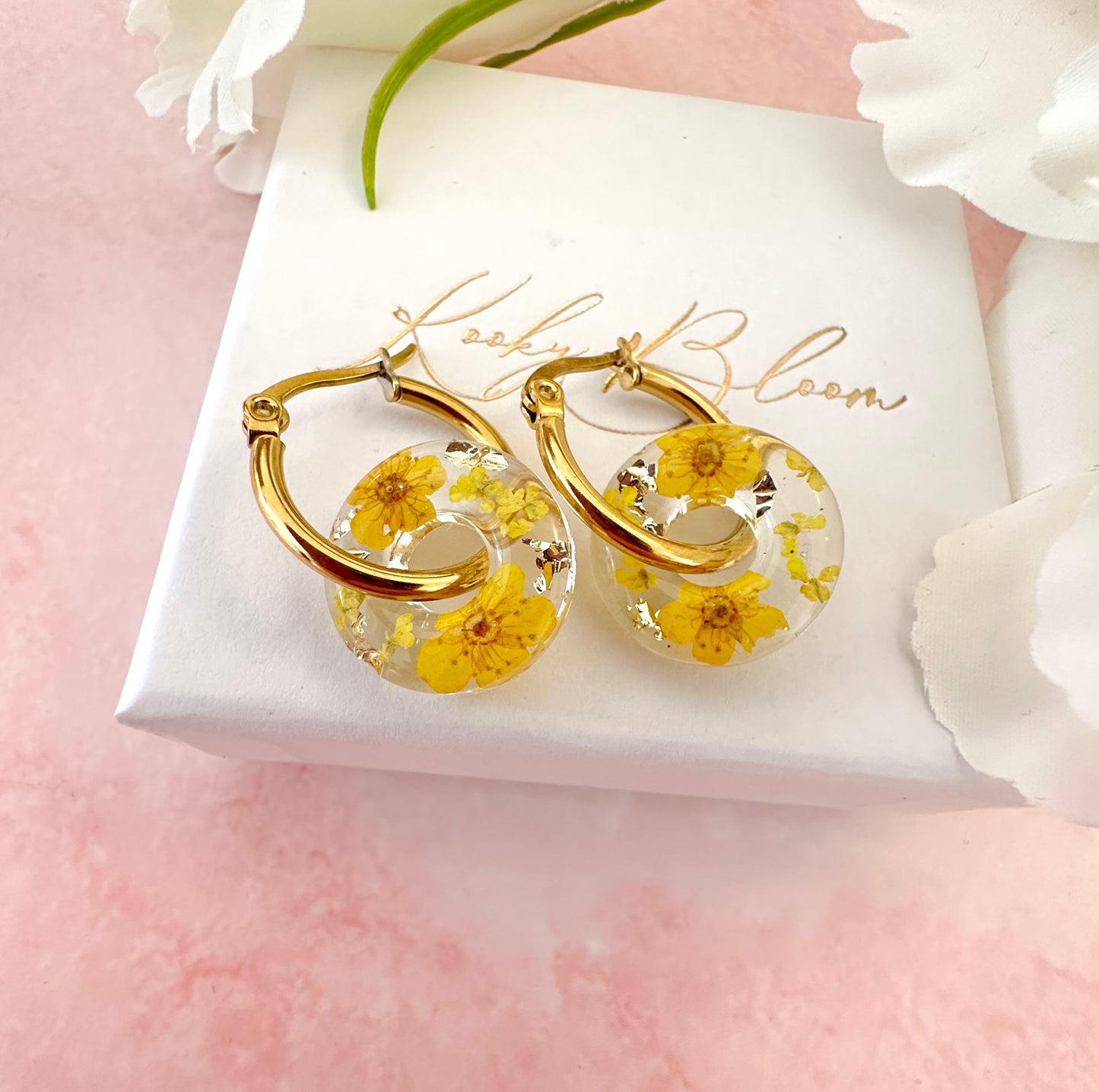 Yellow blossom bloom flower donut earrings.