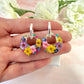 Colourful flower hexagon bloom earrings.