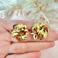 Gold hammered Flower oversized stud earrings.