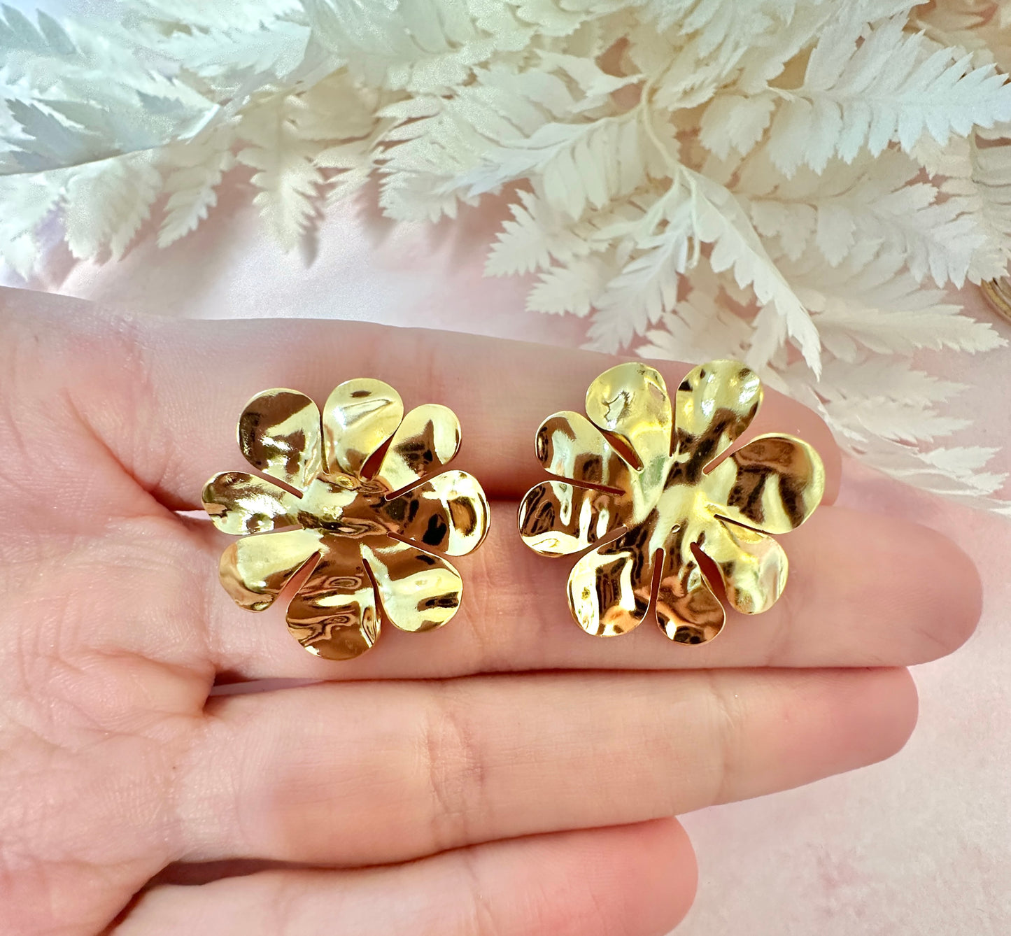 Gold hammered Flower oversized stud earrings.