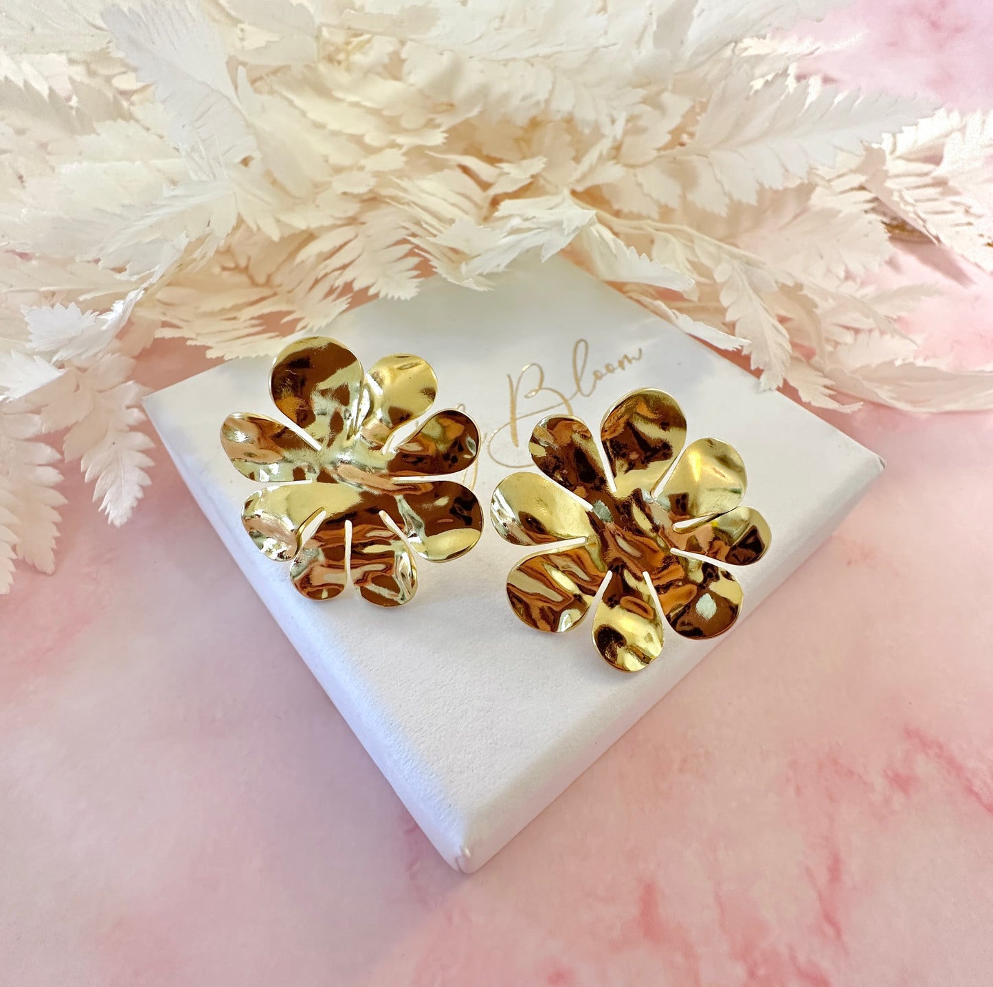 Gold hammered Flower oversized stud earrings.