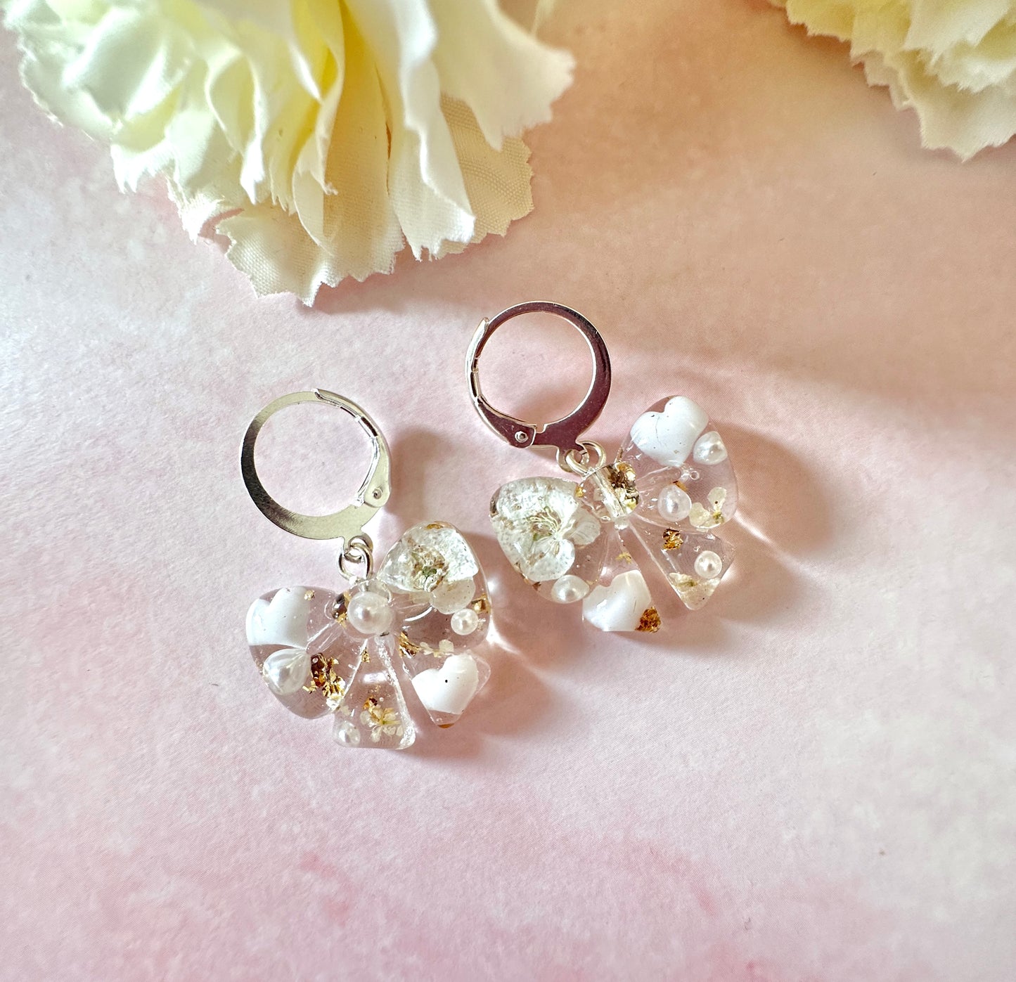 Flower & Pearl Bow bloom Silver Huggie earrings.