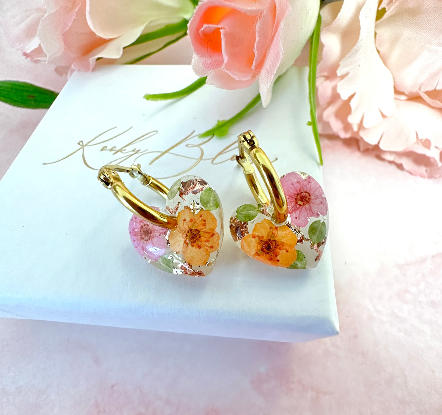 Mini Tangerine pink Flower Heart bloom earrings.