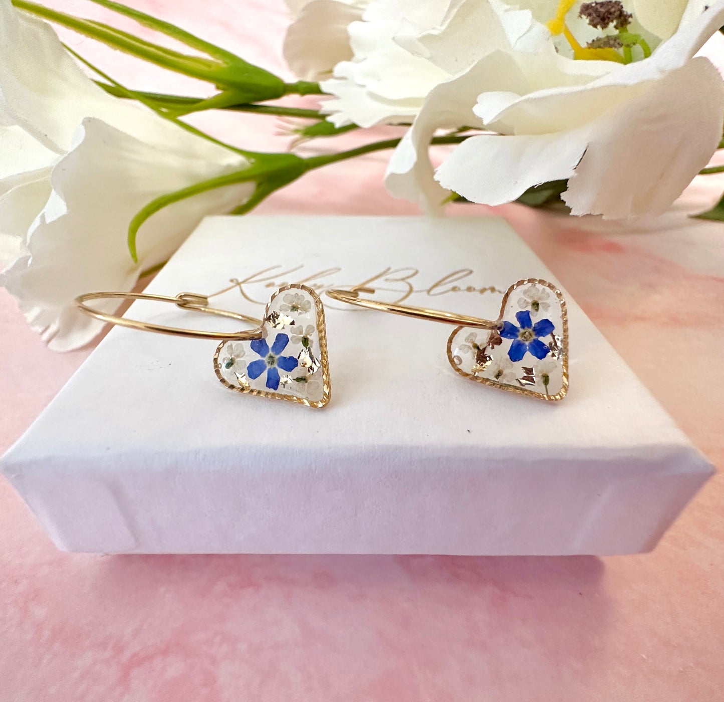 Gold forget me not flower confetti Heart hoop earrings.