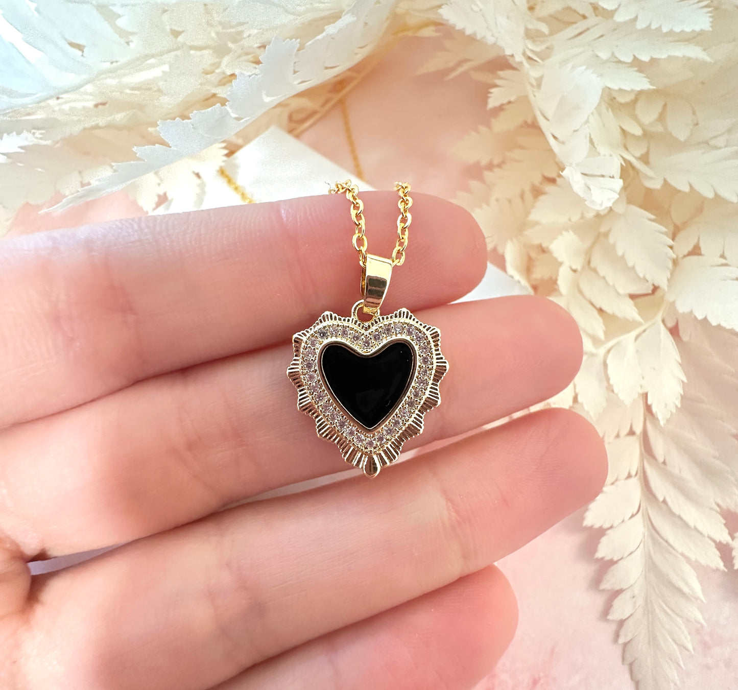 Gold Black heart necklace.