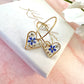 Gold forget me not flower confetti Heart hoop earrings.