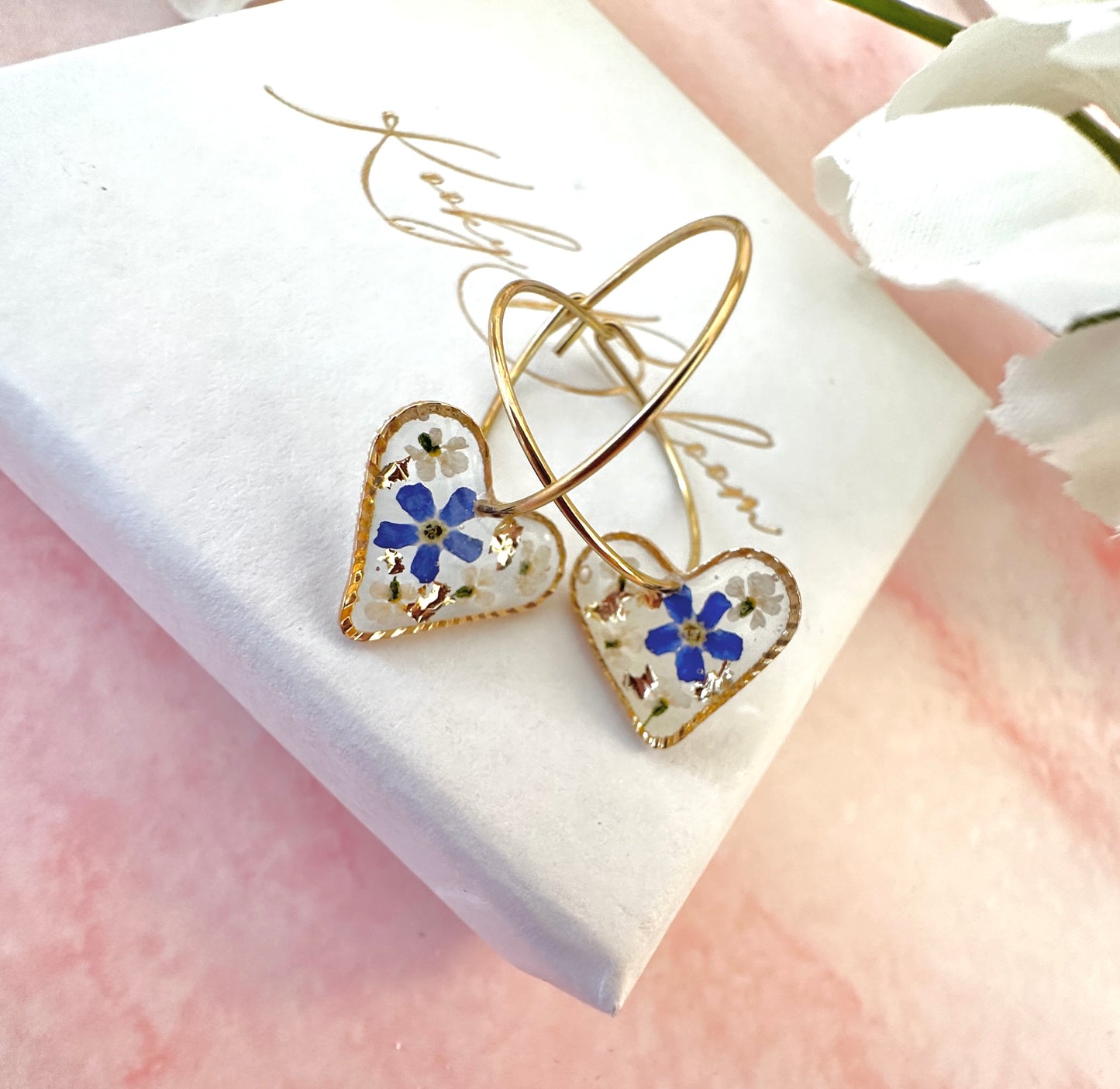 Gold forget me not flower confetti Heart hoop earrings.