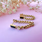 Gold Black stone Chain Loop stud earrings.