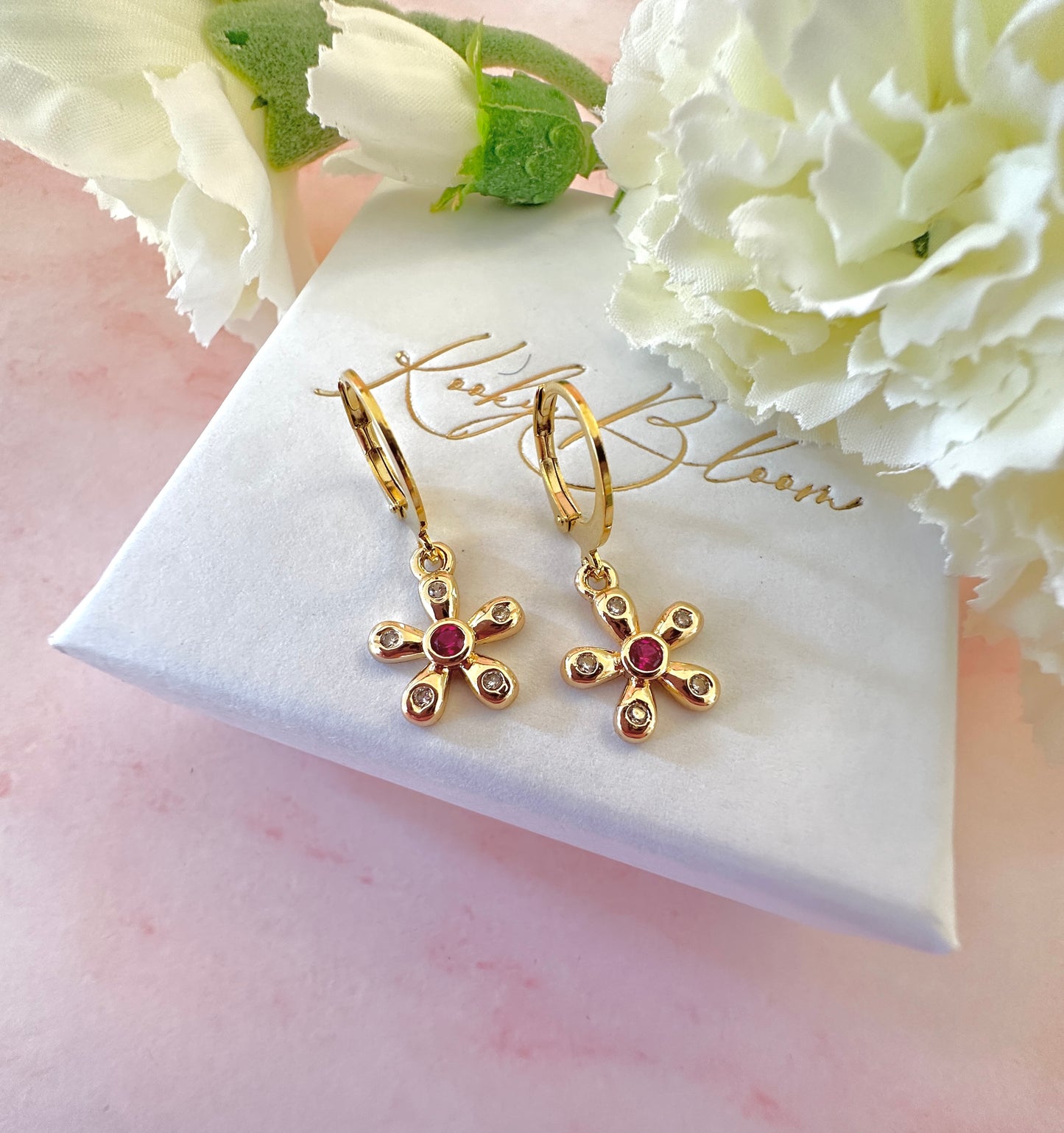 Gold Pink stone Flower huggie hoop earrings.