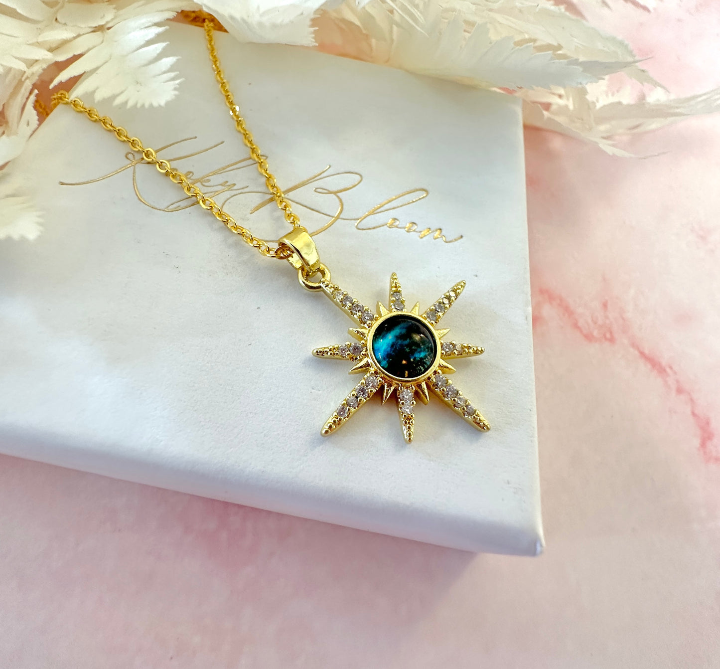 Gold galaxy Cz Star necklace.