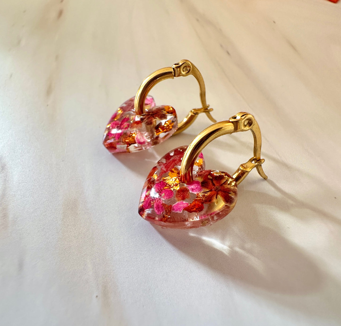 Raspberry ruffle Tiny heart hoop earrings.