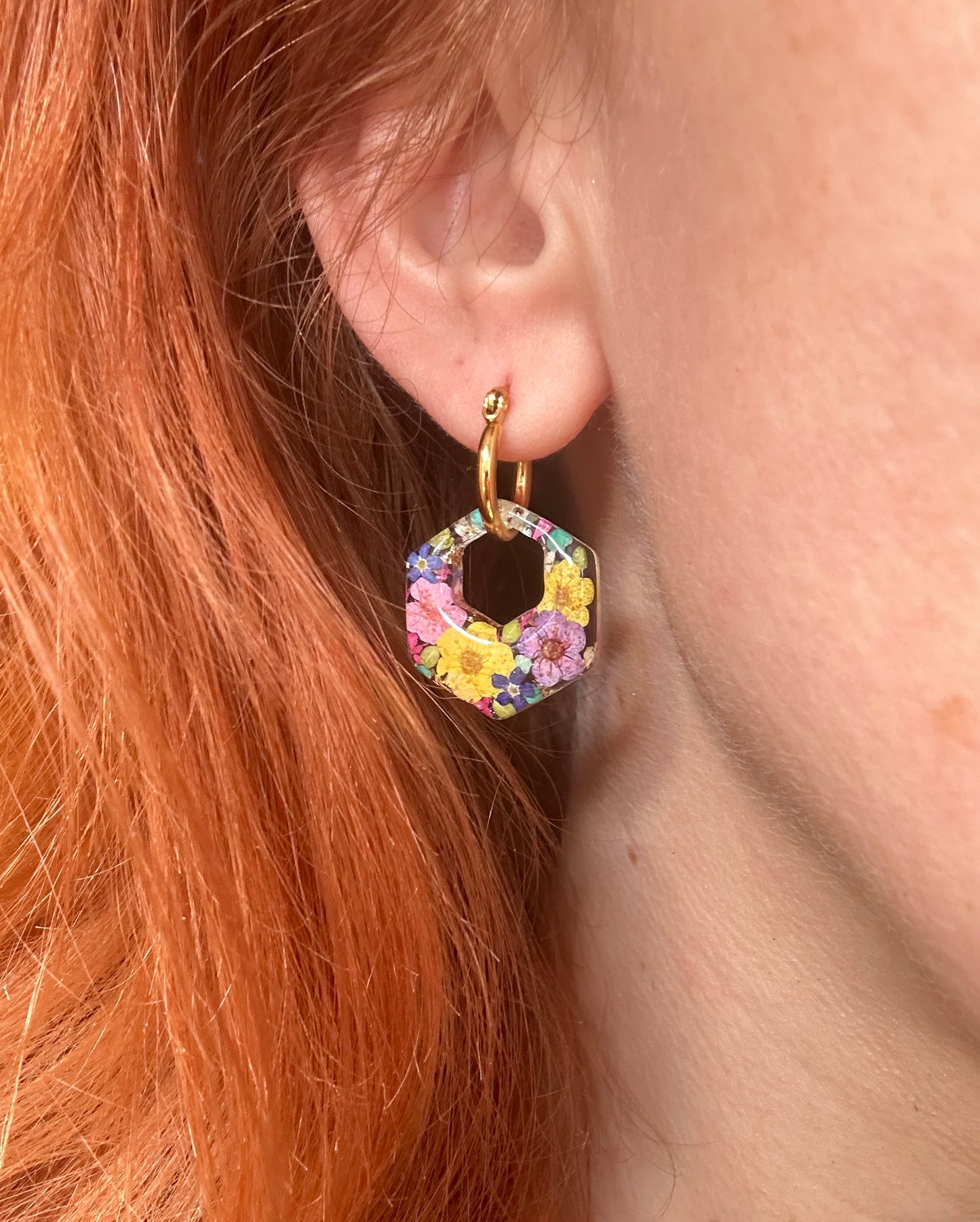 Colourful flower hexagon bloom earrings.