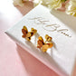 Gold 3d Butterfly stud earrings.