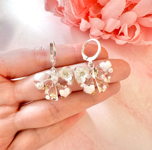 Flower & Pearl Bow bloom Silver Huggie earrings.