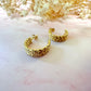 Gold sparkle cut half hoop stud earrings.