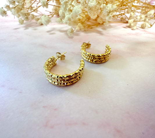 Gold sparkle cut half hoop stud earrings.