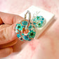 Turquoise Aqua flower bloom donut earrings.