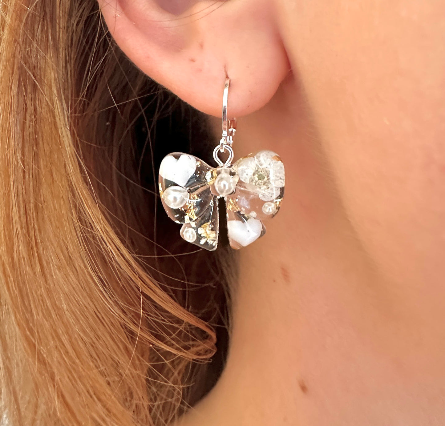 Flower & Pearl Bow bloom Silver Huggie earrings.