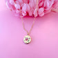 Gold Pink engraved Flower necklace.