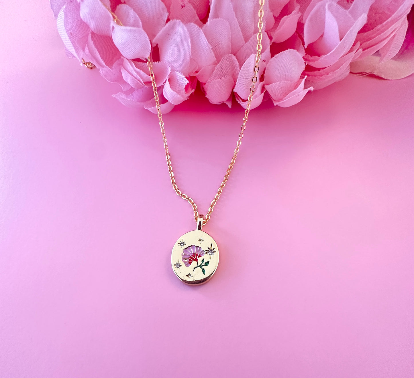 Gold Pink engraved Flower necklace.