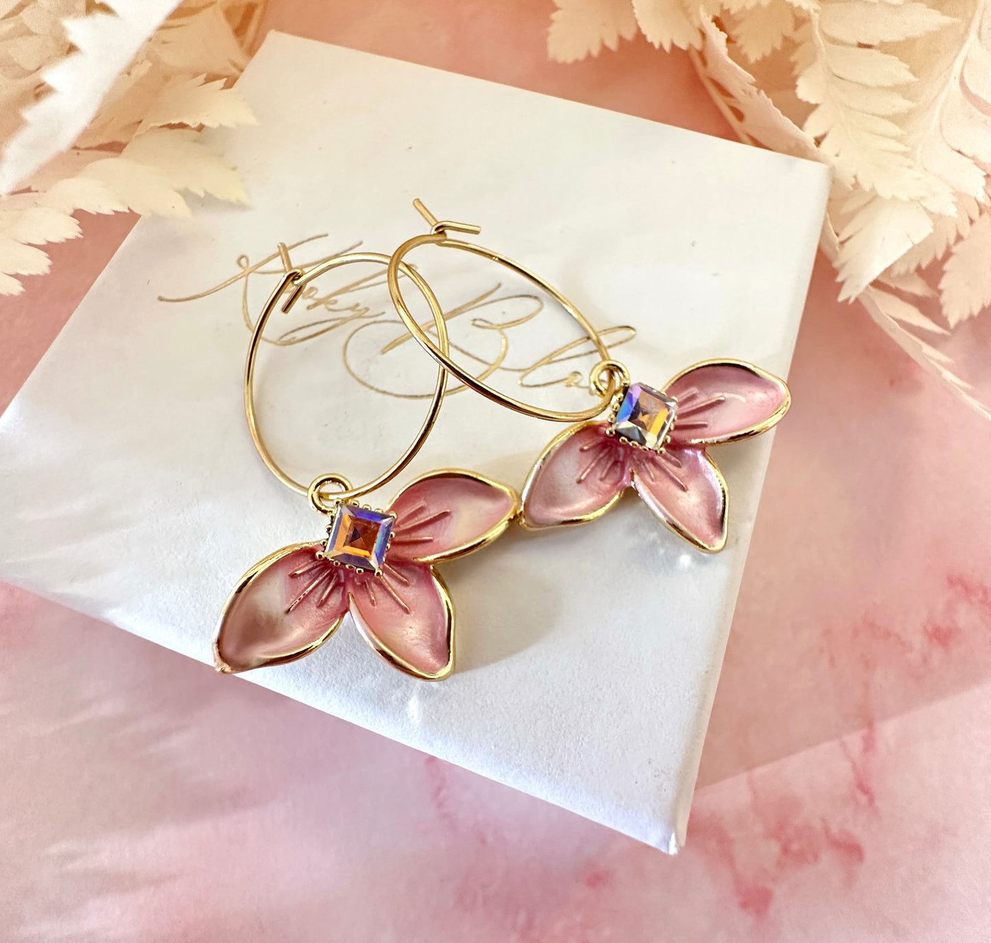 Gold Half flower Hoop earrings.