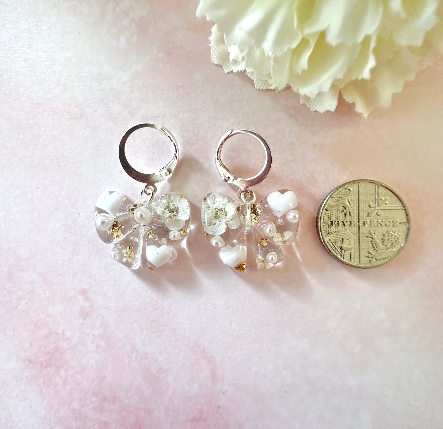 Flower & Pearl Bow bloom Silver Huggie earrings.