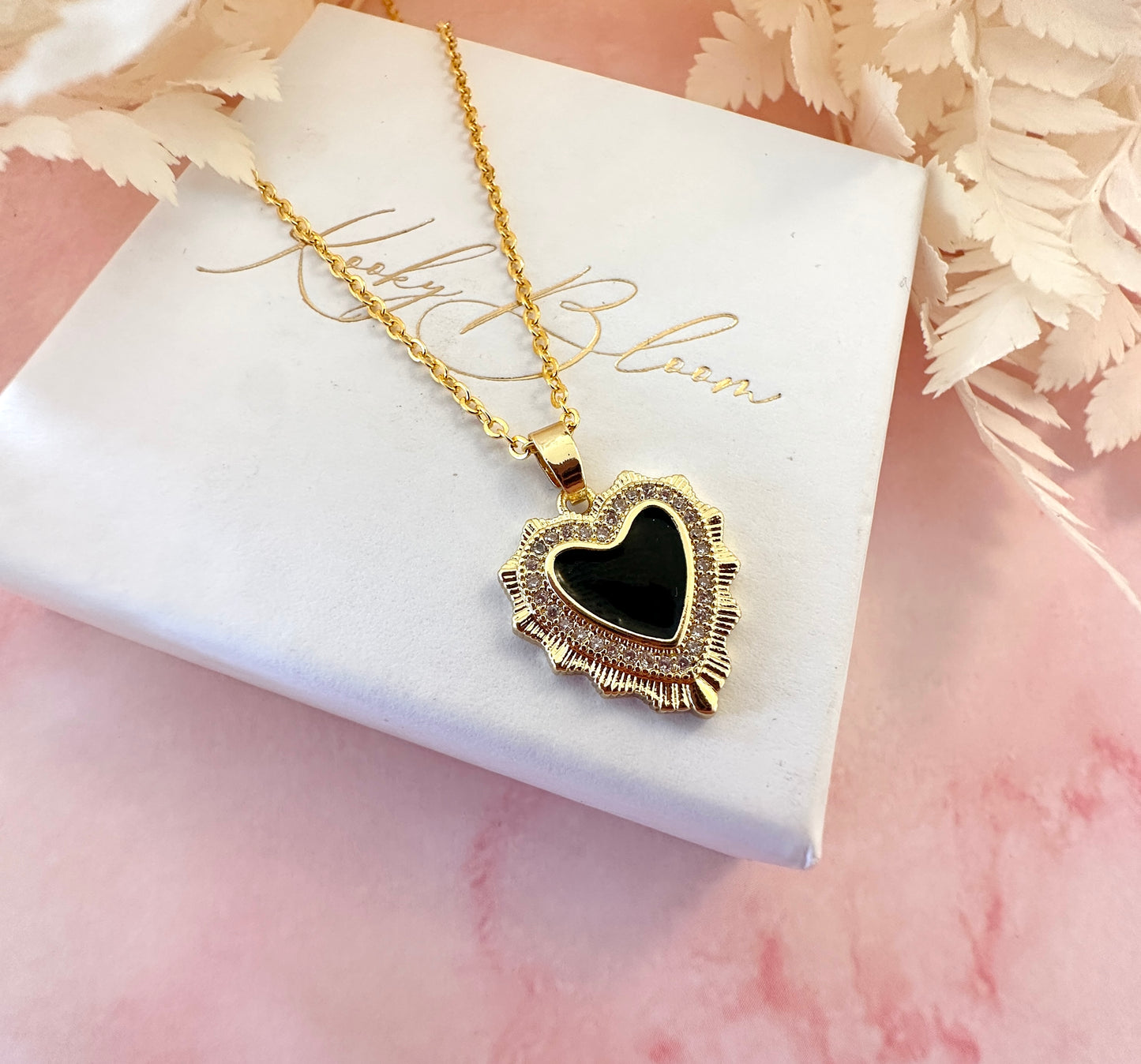 Gold Black heart necklace.