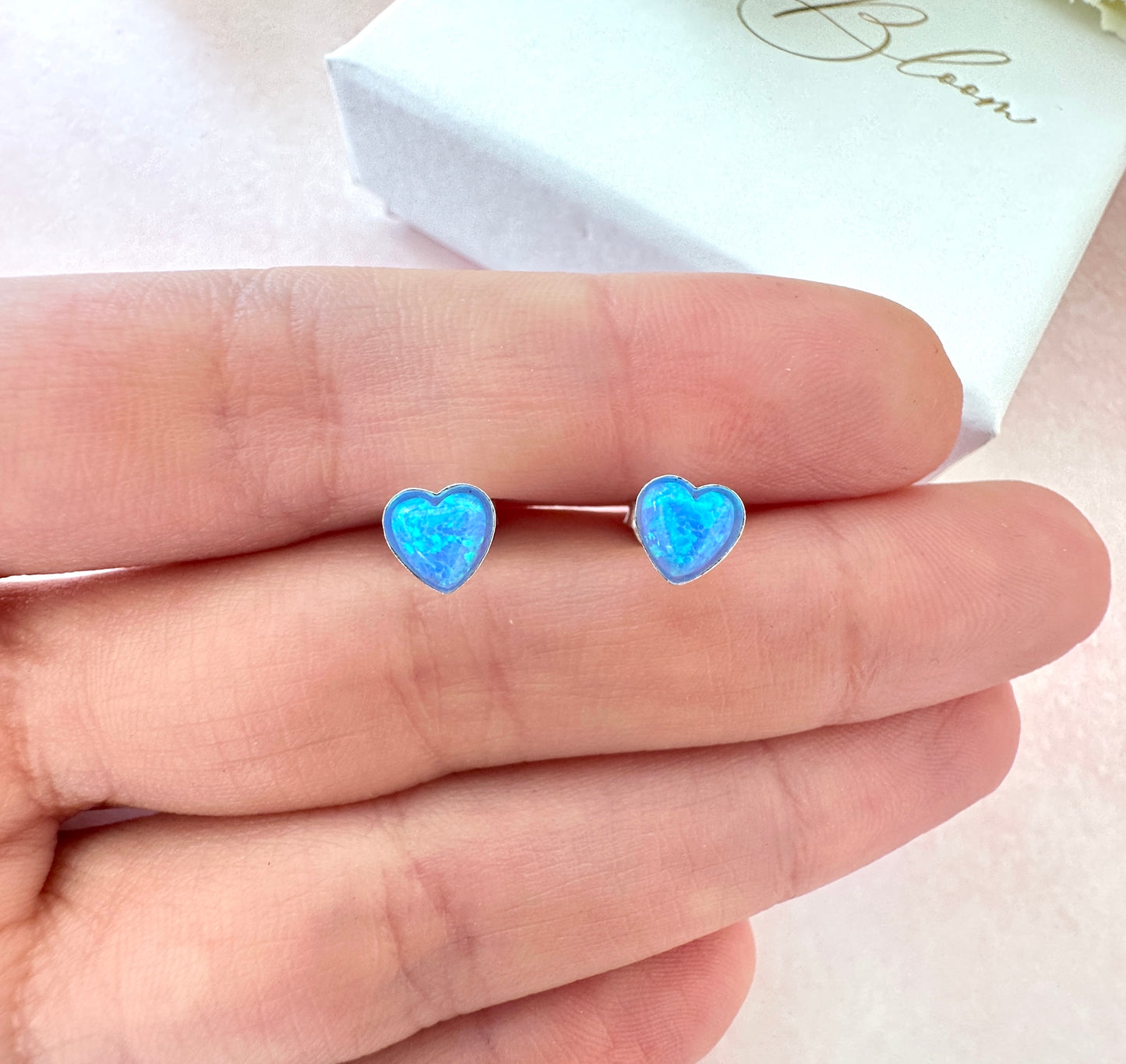 925 Sterling silver Blue Opal heart stud earrings.