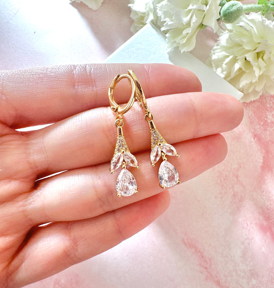 Gold CZ Flower drop Huggie earrings.