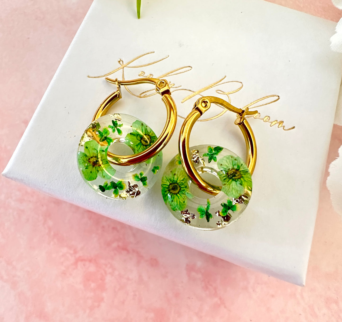 Green blossom bloom flower donut earrings.