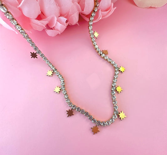 Gold Diamanté Star charm necklace.