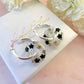 Black & White blossom bloom flower donut earrings.