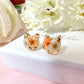 Cat real flower sterling silver stud earrings.