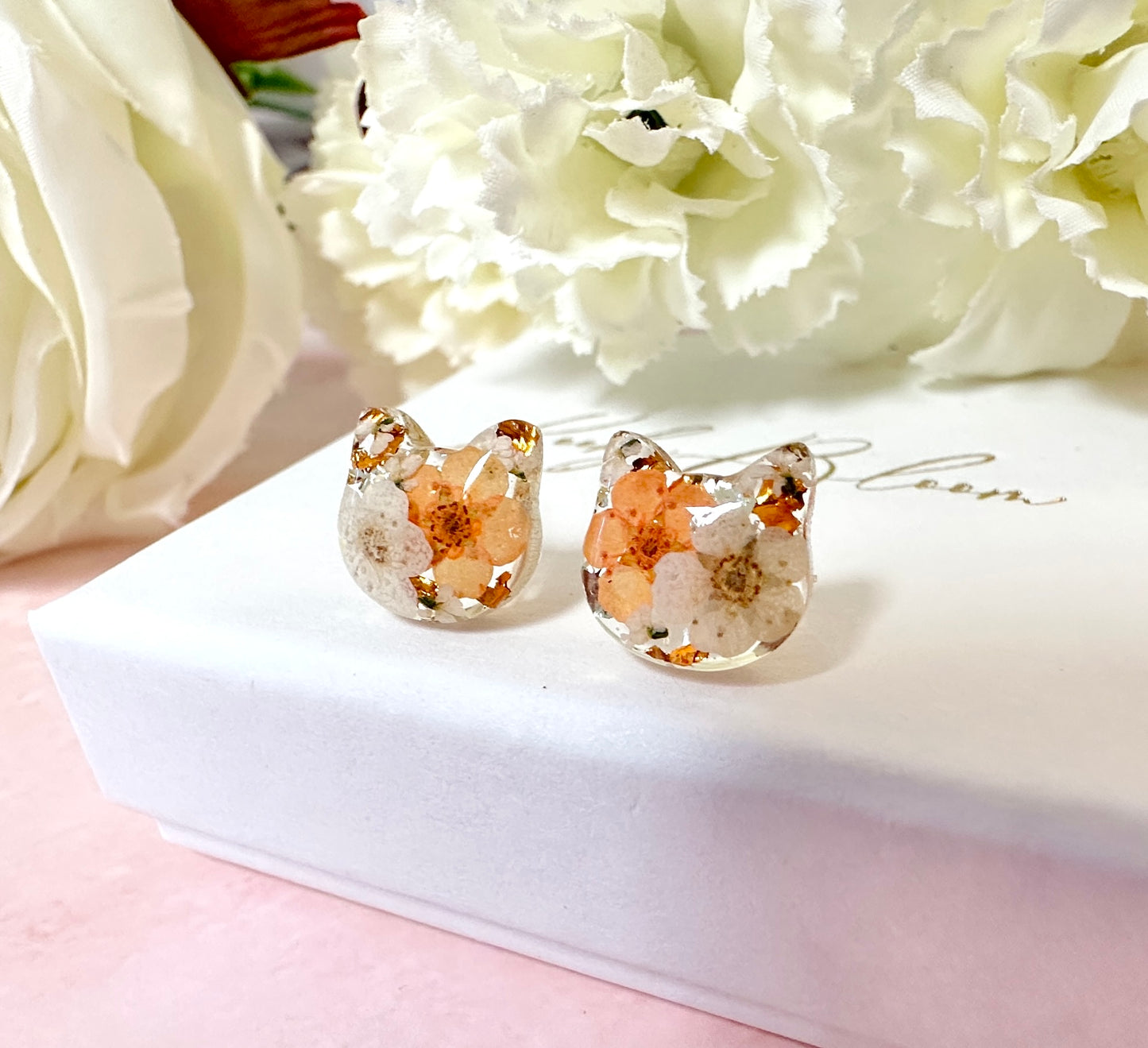 Cat real flower sterling silver stud earrings.