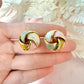 Gold Enamel Knot oversized stud earrings.