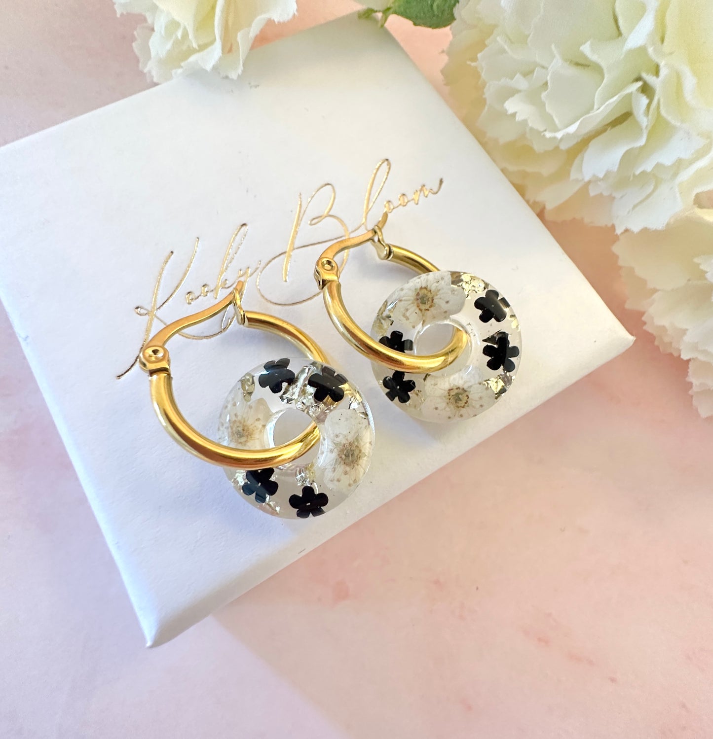 Black & White blossom bloom flower donut earrings.