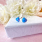 925 Sterling silver Blue Opal heart stud earrings.