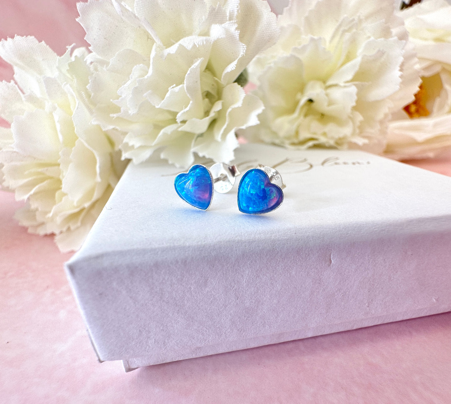 925 Sterling silver Blue Opal heart stud earrings.