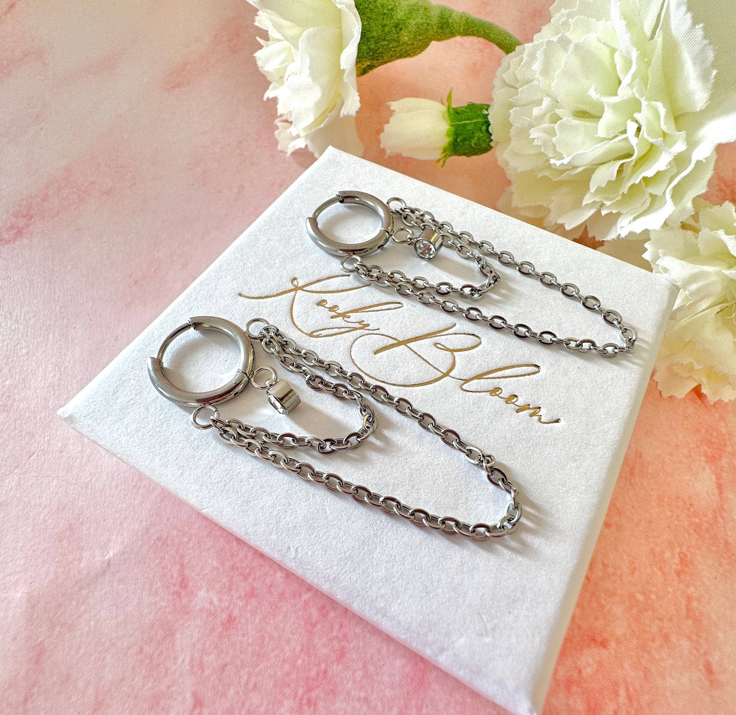 Silver Double chain drape Huggie earrings.